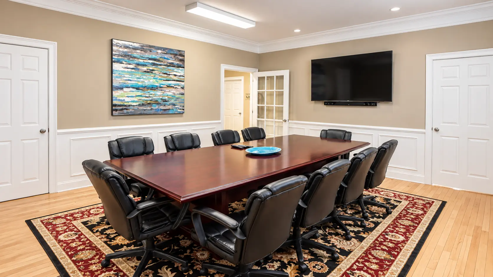 Conference Room for Tenants Conference room with large table and chairs at Easy Office Suites Athens GA