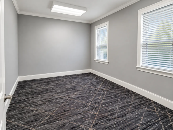 Furnished private office for rent in Athens GA with desk and natural light